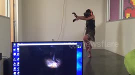 Woman freaks out while playing zombie VR game