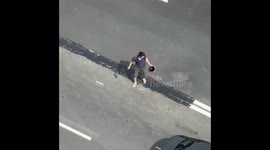 Migrant in Moscow caught painting over road lines for easier access to work site