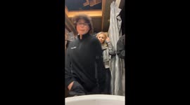 Mirror mishap: head bump caught on camera