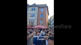 England fans sing Sweet Caroline as they party in Frankfurt, Germany