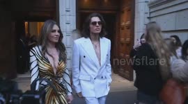 Liz Hurley leaves the V and A summer party with her son