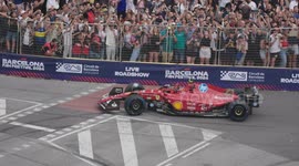Formula 1 race cars paraded through the passeig de gracia street in the cente of barcelona