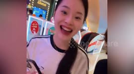 Mother and daughter have black tongues after meal at Chinese restaurant