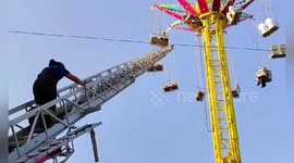 Firemen rescue visitors stranded on amusement park swing in Russia