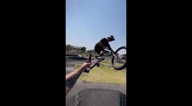 Bicycle trick: Opening soda can with rear tire move