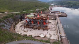 Decommissioned oil rig demolished with controlled explosion