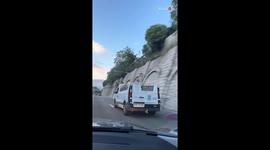 Laugh-out-loud moment as friends stumble upon a van defying convention with its missing roof