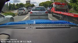 Impatient Driver Clips Turning Trailer
