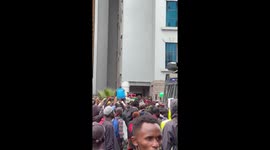 Citizens generously save thirsty police who have earlier on harassed them by firing teargas cannisters to scatter the crowds