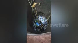 Social organization rescues a cow fell into a 100 feet well filled with poisonous gas stuck in central India