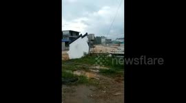 Flash floods caused by rainstorm collapse houses and sweep away vehicles in China