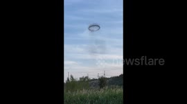 Residents astonished as mysterious black ring spotted above city in China