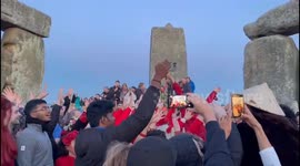 Pagan choir sing at Stonehenge during summer solstice