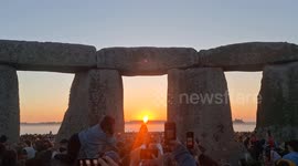 Spectators chant 'off with her head' to woman blocking sun at Stonehenge during summer solstice
