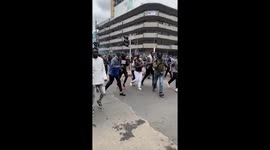 Protesters flee tear gas in Nairobi during demonstrations against Finance Bill 2024