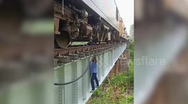 India: Loco pilots go extra mile to fix train on bridge in northern India