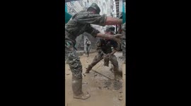 Armed police help with post-flood cleanup in China's Guangxi