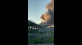 Massive fire engulfs decommissioned railway trestle near Oak Street Bridge