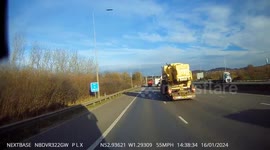 Combine Harvester on the back of a Wagon & Drag trailer weaving unsteady