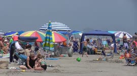Millions of Americans Seek Relief from Extreme Heat at the Beach