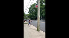 5’6 man uses vertical leap to  touch 11ft sign