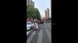 Firemen rescue distressed man from building in China