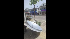 Chinese woman masters ingenious solar cooking in hot weather