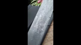 How to create a handmade kitchen knife by throwing a pink flower and metal in a box and shake it roughly.