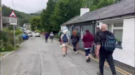 Builder climbs 3,500ft mountain carrying a tumble dryer on his back