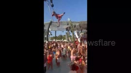 New video from Wayne Lineker's Ibiza club of performer plummeting into crowd