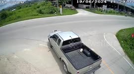 Motorcycle rider crashes and slides UNDER car but somehow survives
