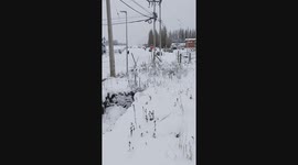 Car Slides Down Snowy Hill In Coyhaique