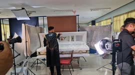Graduate poses in coffin for touching tribute to parents