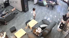 Toddler accidentally knocks model from stand
