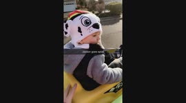 Boy Face Plants riding down Slide
