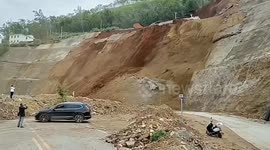 Rocks and soil cascade like waterfall as landslide hits southern China