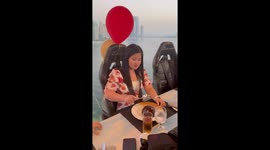 Woman has sky high surprise when boyfriend proposes at crane dinner in Dubai