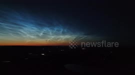 Drone captures rare solar maximum noctilucent clouds over UK lake last night