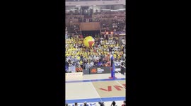 Crowd keeps afloat giant volleyball at match in Thailand