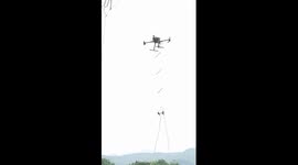 Robot maintains power transmission lines in C China