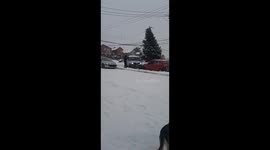 Car slides on ice, triggers multi-car collision