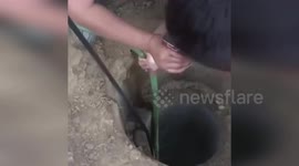 Firemen lower village dwarf into well to rescue trapped boy, 3, in China