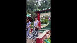 Hilarious moment two tourists in matching outfits bump into each other