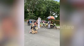 Preacher blocks pride march in the Philippines
