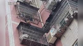 China:  Toddler Rescued by Firefighters After Scary Fall from 6th Floor Balcony
