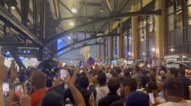 US: Fan In Grimace Costume Chugs Beer During Rain Delay At Citi Field, New York 3