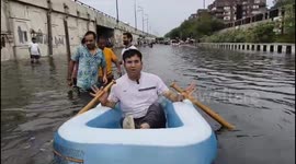 Delhi Rains: BJP Councillor Ravinder Singh Negi Uses Boat To Travel Across Flood Affected Areas