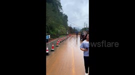 Mountainside collapse on busy highway amid heavy rainfall in southern China