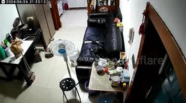 Homemade alcohol explosion in fridge sends door open and liquid spewing out in China