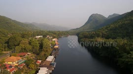 Thailand: Drone footage of the river running through Thailand's Erawan National Park